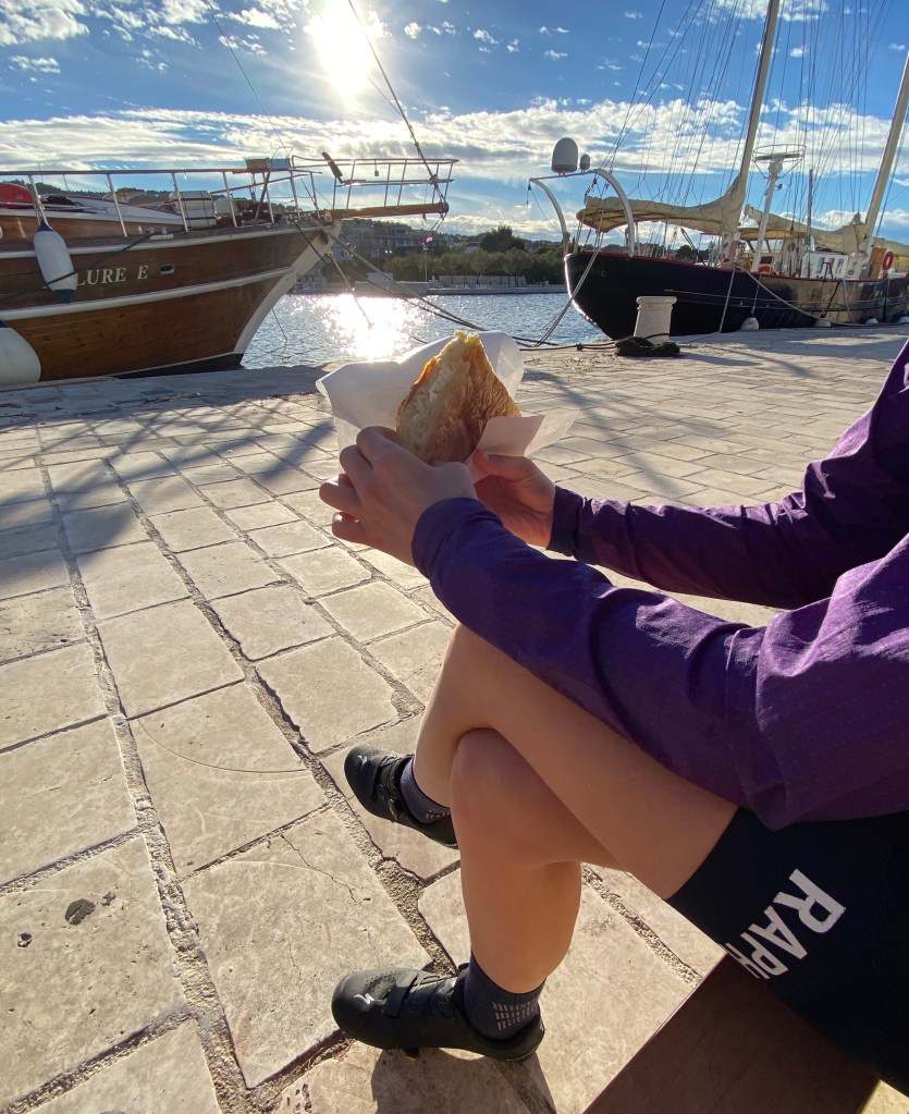 Burek being eaten by cyclist, Brac Island